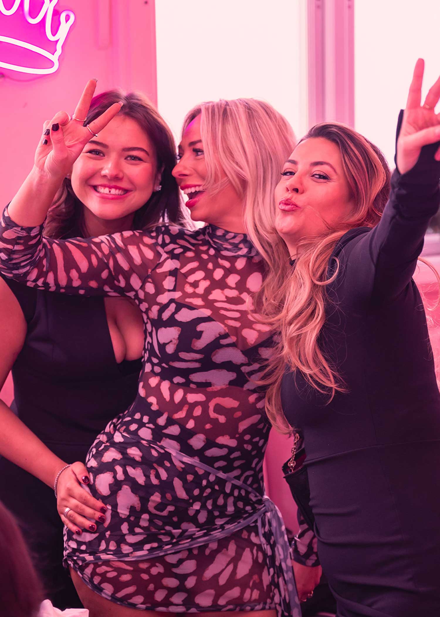 Girls wearing brunch outfits and having fun at a lively bottomless brunch event in Greenwich
